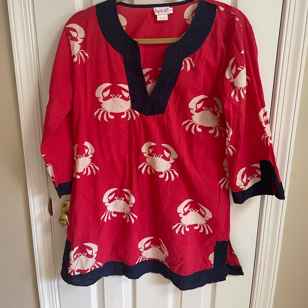 Used.good condition top it off size medium crab red white and blue swim coverup